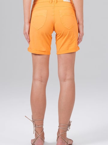M.O.D MIRACLE OF DENIM Slim fit Trousers in Orange