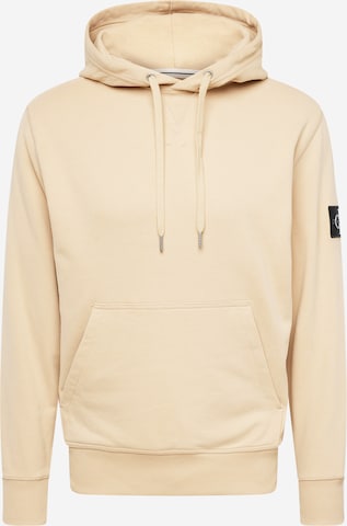 Sweat-shirt Calvin Klein Jeans en beige : devant