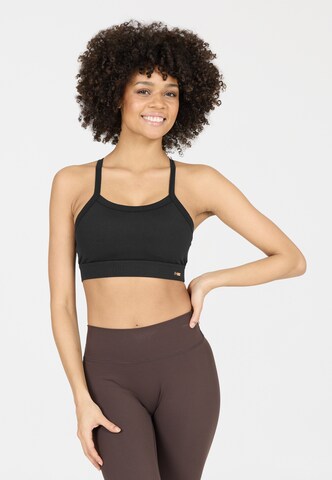 Athlecia Low support Sport bh 'Bloom V2' in Zwart: voorkant