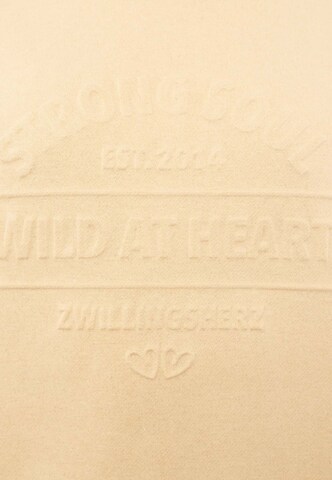 Sweat-shirt 'STRONG SOUL' Zwillingsherz en beige