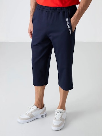 Tommy Life Wide leg Trousers in Blue: front