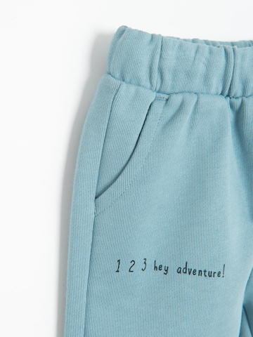 Effilé Pantalon Cool Club en bleu