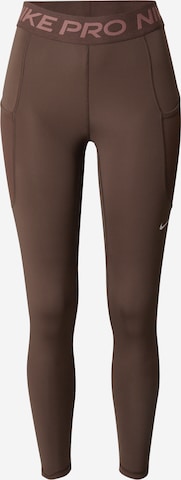 NIKESkinny Sportske hlače - smeđa boja: prednji dio