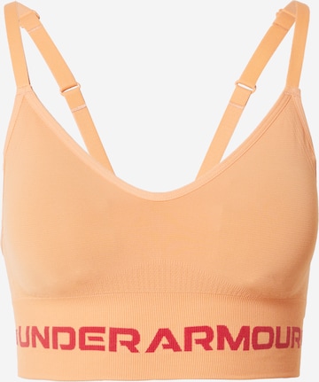 UNDER ARMOUR Sports bra in Orange: front