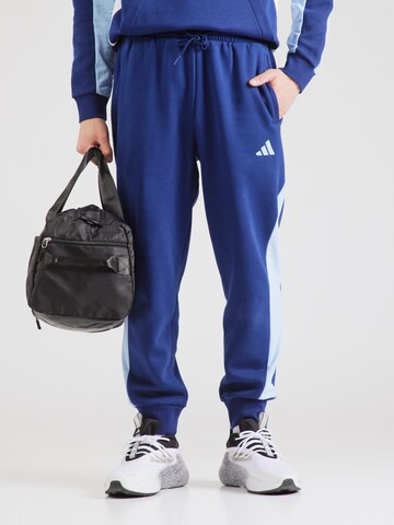 Tapered Pantaloni sportivi 'Ess' di ADIDAS SPORTSWEAR in blu: frontale