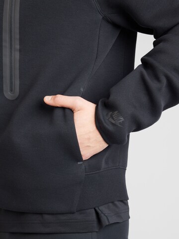 Veste de survêtement 'TCH FLC N98' Nike Sportswear en noir