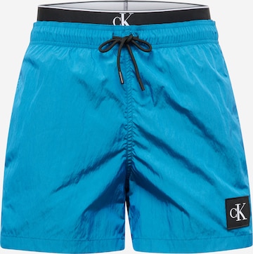 Calvin Klein Swimwear Board Shorts in Blue: front