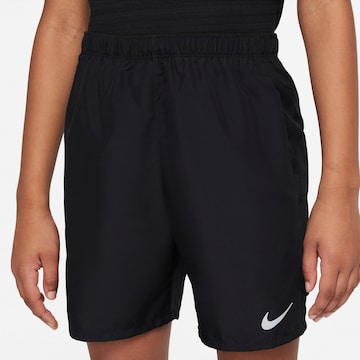 NIKE Regular Workout Pants in Black: front