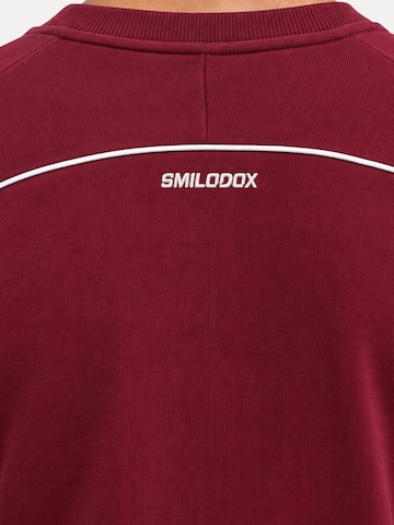 Sweat-shirt 'Brenvaro' Smilodox en rouge