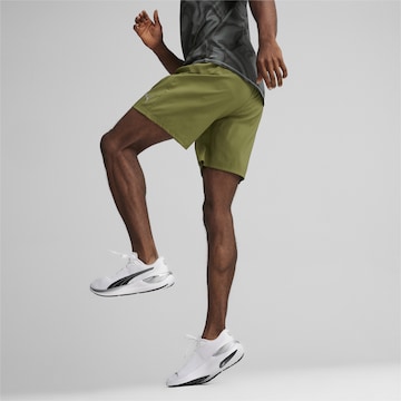 PUMA Regular Workout Pants 'Favourite' in Green