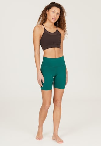 Athlecia Skinny Sporthose 'Almy' in Grün