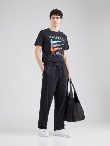 Nike Sportswear Loosefit Housut 'CLUB' värissä musta