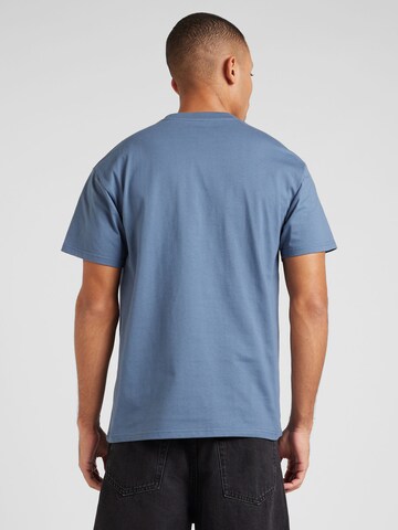 Tricou 'Chase' de la Carhartt WIP pe albastru