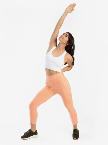Spyder Skinny Workout Pants in Orange