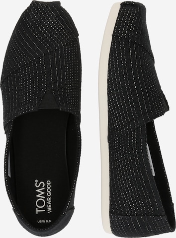 TOMS Slip-Ons in Black