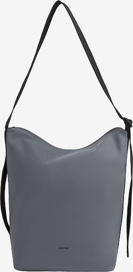 Rankinė su ilgu dirželiu iš Calvin Klein, spalva – opalo / juoda, Prekių apžvalga