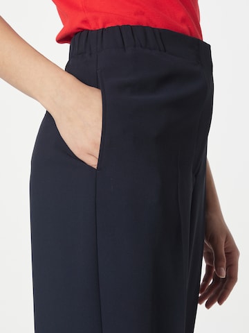 TOMMY HILFIGER - Pierna ancha Pantalón de pinzas 'Grazer' en azul