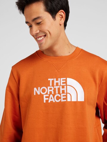Felpa 'DREW PEAK' di THE NORTH FACE in arancione