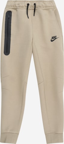 Pantaloni 'TECH FLEECE' de la Nike Sportswear pe bej: față