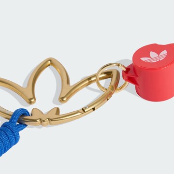 ADIDAS ORIGINALS - Llavero 'KEY' en oro