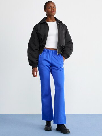 Nike Sportswear Flared Trousers in Blue