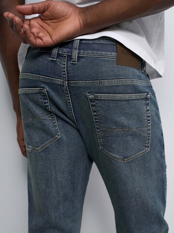 Coupe slim Jean Salsa Jeans en bleu