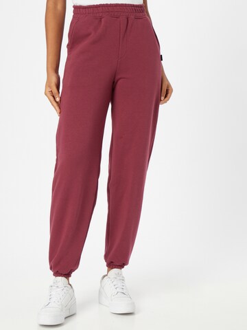 Colourful Rebel Tapered Pants in Red: front