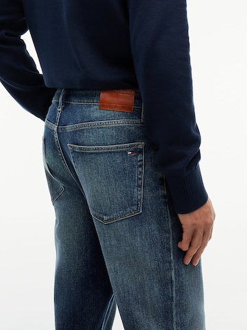 Tommy Jeans Bootcut Jeans 'Ryan' in Blauw
