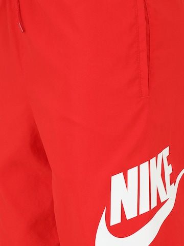 Nike Sportswear Loosefit Kalhoty 'Club' – červená