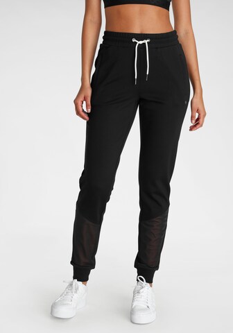 OCEAN SPORTSWEAR Tapered Workout Pants in Black: front