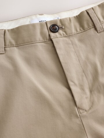 Slimfit Pantaloni chino di Next in grigio