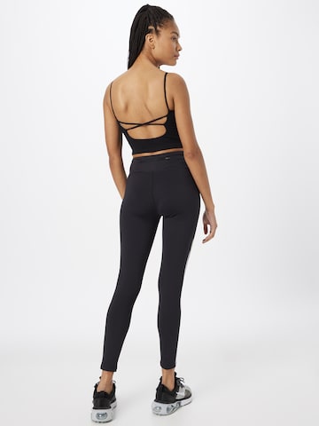 Skinny Pantaloni sportivi di 4F in nero