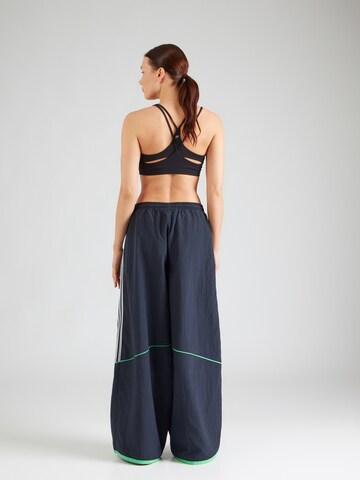 ADIDAS ORIGINALS Laienev Püksid 'TEAMGEIST', värv sinine