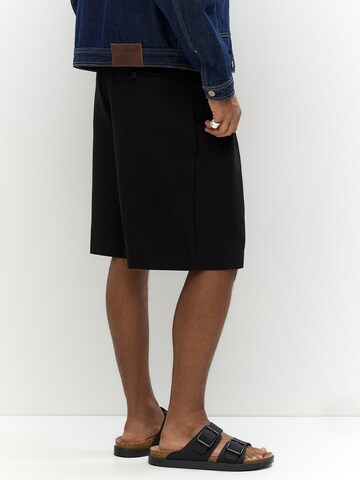 Baggy Pantalon à pince Pull&Bear en noir