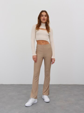 EDITED Flared Trousers 'Zihna' in Beige