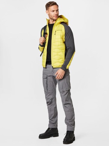 Veste de sport 'Helium' PEAK PERFORMANCE en jaune