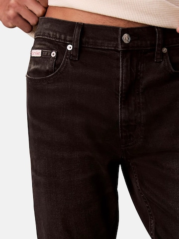 Calvin Klein Tapered Jeans 'CALVIN KLEIN CLASSIC TAPER AVERY PANTALONE' i svart
