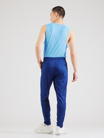 NIKETapered Sportske hlače 'Academy 25' - plava boja