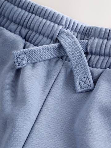Set Next en bleu