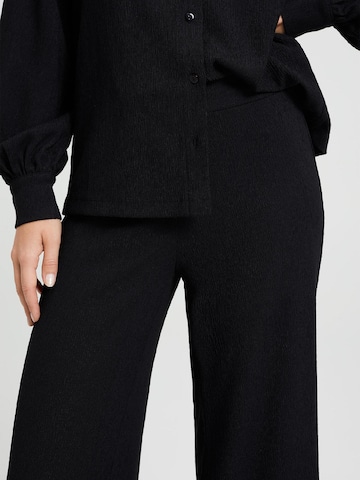 WE Fashion Zvonové kalhoty Kalhoty – černá