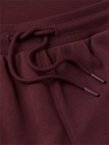 TOMMY HILFIGER Loose fit Trousers 'Essential' in Brown