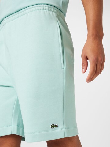 LACOSTE Regular Trousers in Green