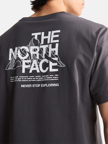 Maglietta 'M MOUNTAIN SKETCH SS TEE RELAXED' di THE NORTH FACE in nero