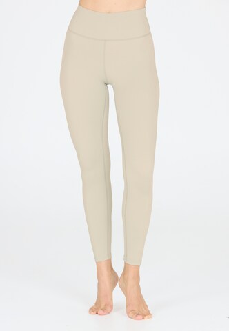 Athlecia Skinny Sports trousers 'FRANZ' in Brown: front