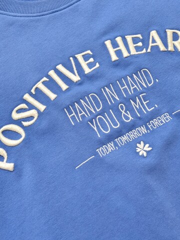 Sweat-shirt 'Sweatpullover mit Stickerei Positiv Hearts - SelinaC' LIKS. Munich en bleu