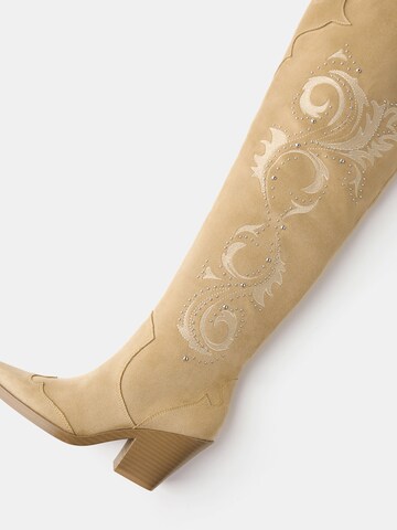 Bershka Buty kowbojskie w kolorze beżowy