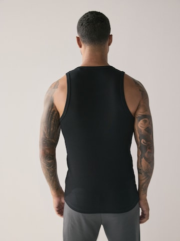 Next Aluspaita värissä musta