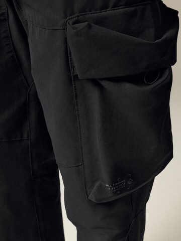 Next - Tapered Pantalón cargo en negro