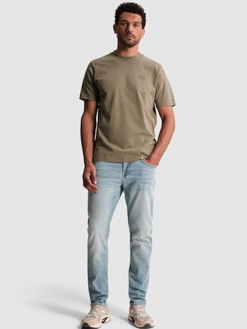 Maglietta 'T-shirt in jersey with back artwork' di CAST IRON in verde