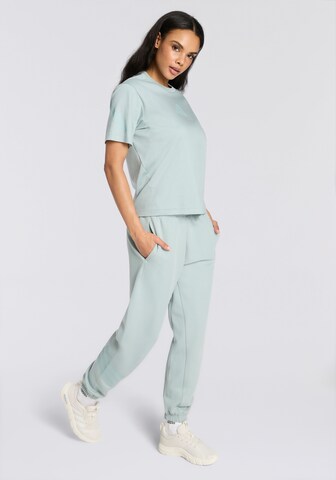 ADIDAS SPORTSWEAR Tapered Pajama Pants in Green